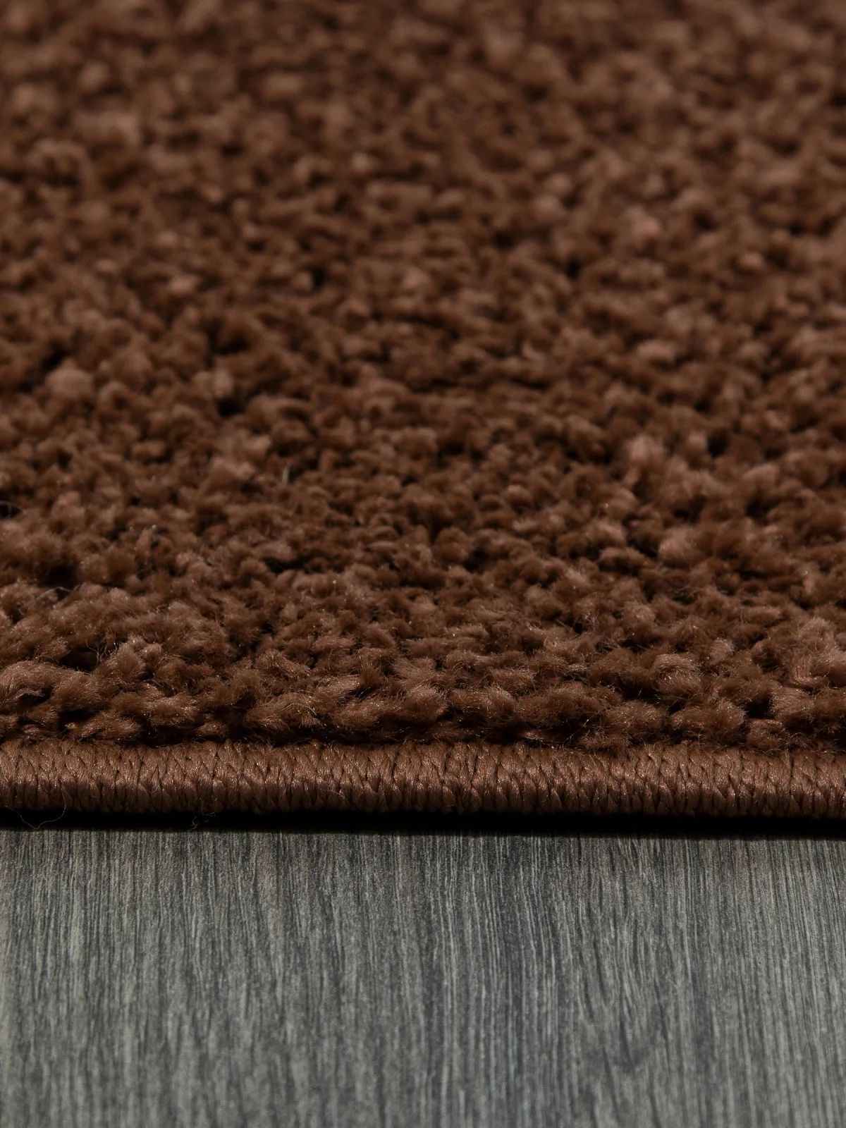 Однотонный ковер LANA T600 - BROWN из полипропилена Россия